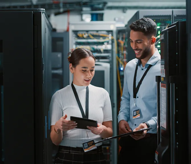Professionals in server room